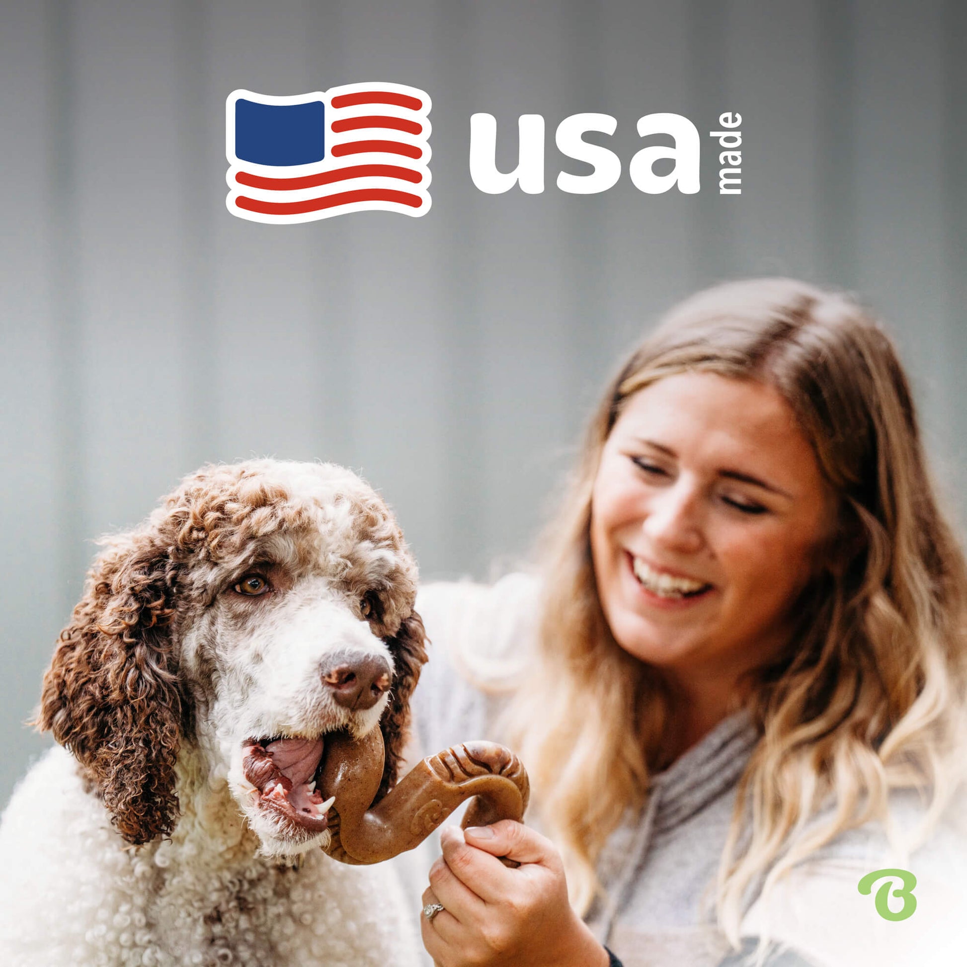 Image of smiling women handing tripe bone to dog’s mouth. Text reads: USA made.